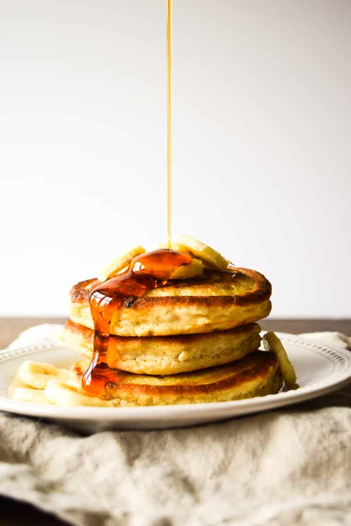 These fluffy and light gluten-free pancakes are super filling and packed with fresh bananas!