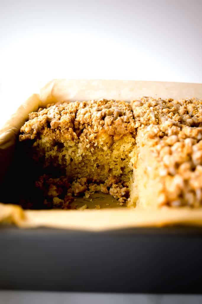  A soft, tender, easy-to-make crumb cake, topped with cinnamon apples and heavy on the crumbs! Get the recipe at runlifteatrepeat.com!