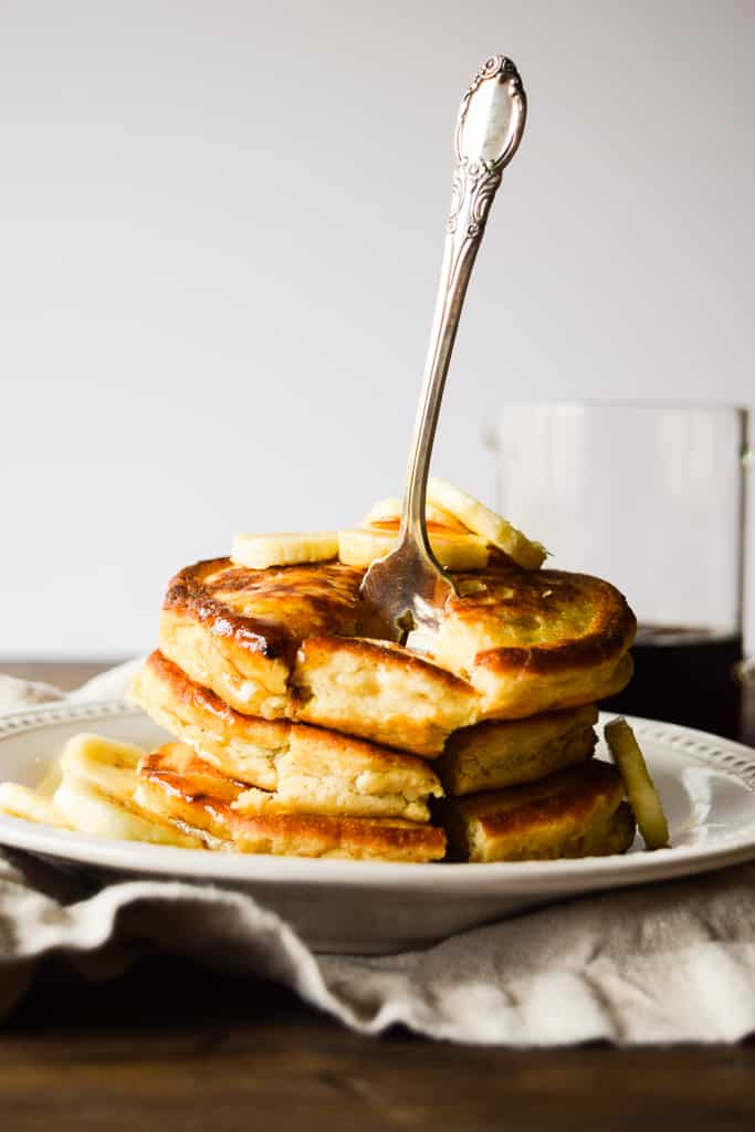 These fluffy and light gluten-free pancakes are super filling and packed with fresh bananas!