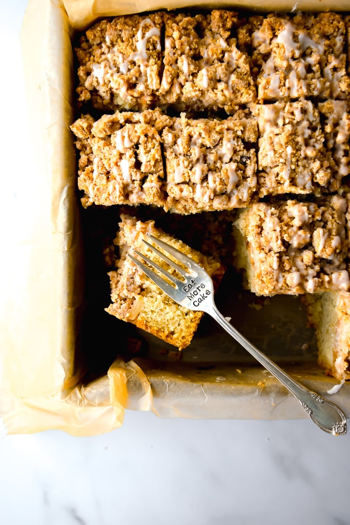  A soft, tender, easy-to-make crumb cake, topped with cinnamon apples and heavy on the crumbs! Get the recipe at runlifteatrepeat.com!