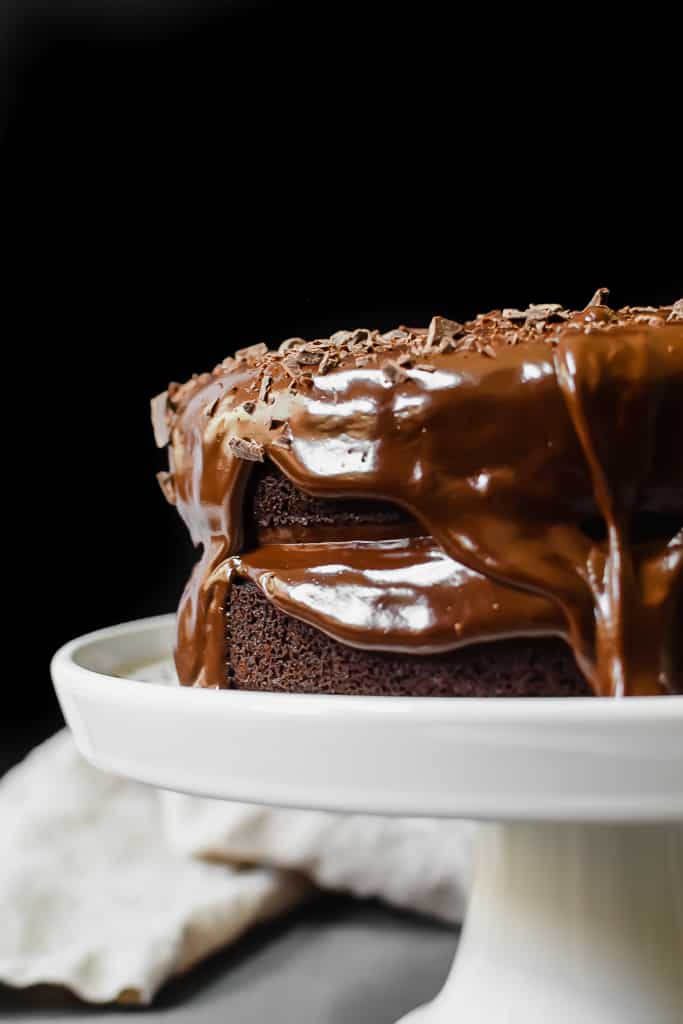 My favorite homemade paleo chocolate cake recipe. It's the richest, the fudgiest and a crowd pleaser! 