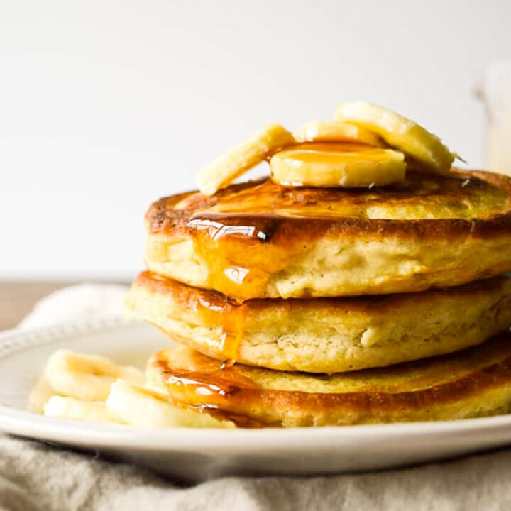 These fluffy and light gluten-free pancakes are super filling and packed with fresh bananas!