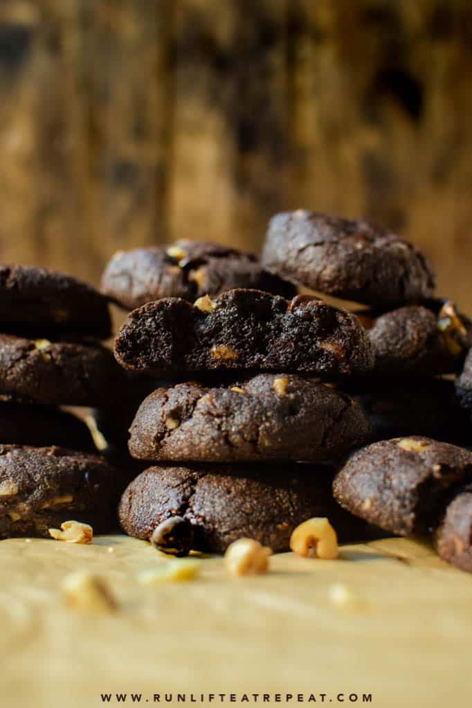 These brownie cookies are fudgy, thick, and chewy with big chunk of chocolate and walnuts studded throughout! Find the recipe at runlifteatrepeat.com.