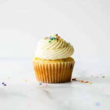Funfetti Birthday Cupcakes. These are the softest and fluffiest vanilla cupcakes studded with rainbow sprinkles. Perfect for a birthday celebration! Find the recipe at runlifteatrepeat.com.