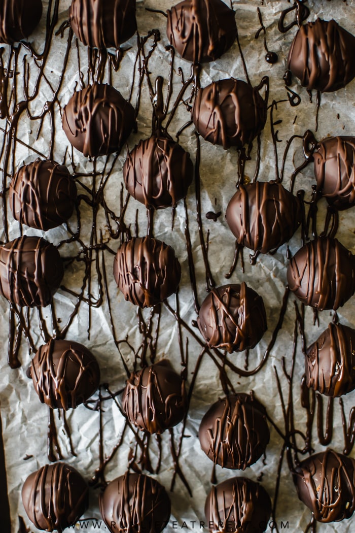 One bowl and minimal ingredients to make these no-bake cookie dough truffles. Ready in less than 30 minutes! Recipe on runlifteatrepeat.com. #truffles #paleo #cookiedough #glutenfree #dairyfree