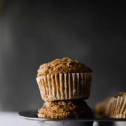 Healthy whole wheat muffins filled with shredded apples, tons of cinnamon spice and zero refined sugar! Find the recipe at runlifteatrepeat.com. #wholewheatmuffins #muffins #breakfast #apple #cinnamon #dairyfree