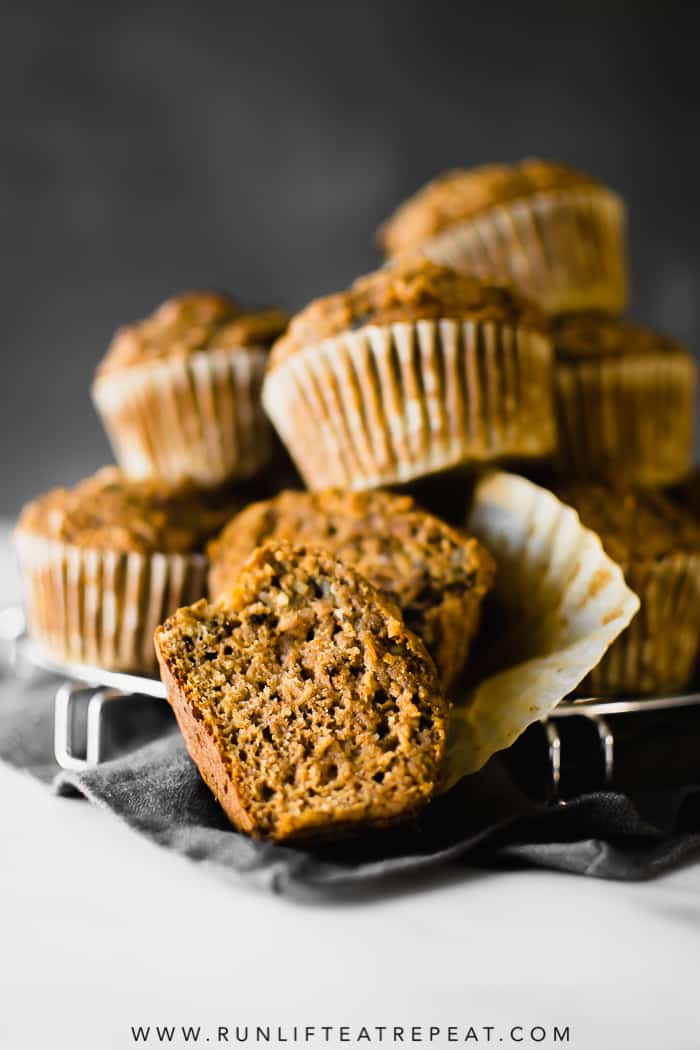 Healthy whole wheat muffins filled with shredded apples, tons of cinnamon spice and zero refined sugar! Find the recipe at runlifteatrepeat.com. #wholewheatmuffins #muffins #breakfast #apple #cinnamon #dairyfree