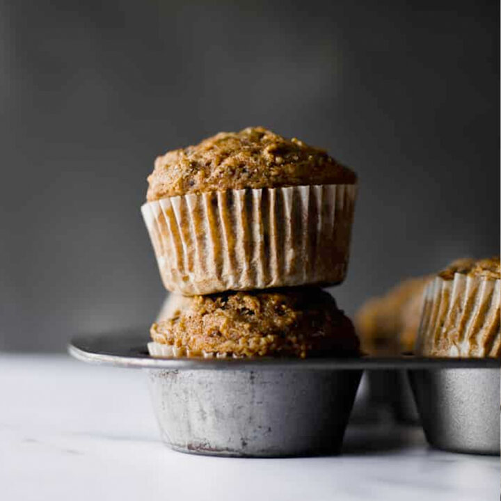 Healthy whole wheat muffins filled with shredded apples, tons of cinnamon spice and zero refined sugar!