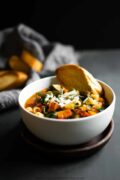 This minestrone soup is a favorite for obvious reasons. It's hearty, filled with tons of vegetables, and packed with flavor. It's the soup recipe that you'll make again and again! #soup #dinner #recipe #easy #healthy