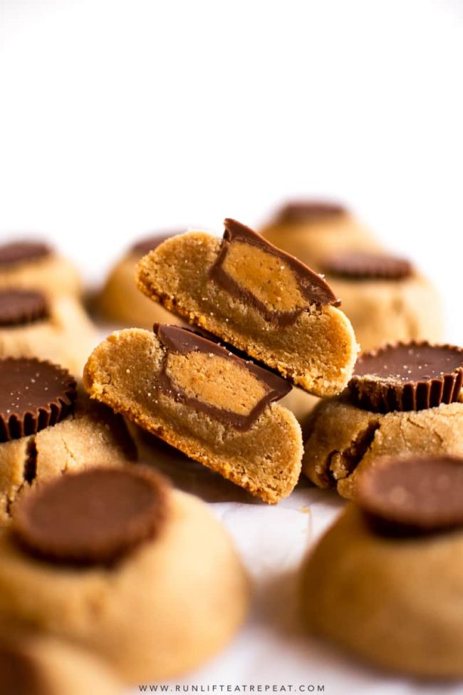 These soft, thick and chewy peanut butter cookies are topped with Reese’s peanut butter cups. Basically every peanut butter obsessed person's dream. #cookies #peanutbutter #christmas #blossoms