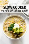 This slow cooker verde chicken chili is homemade, full of flavor, satisfying, and easy to make. Add all the ingredients to the slow cooker and dinner is done when you get home! Get creative with your toppings or use what you have on hand!