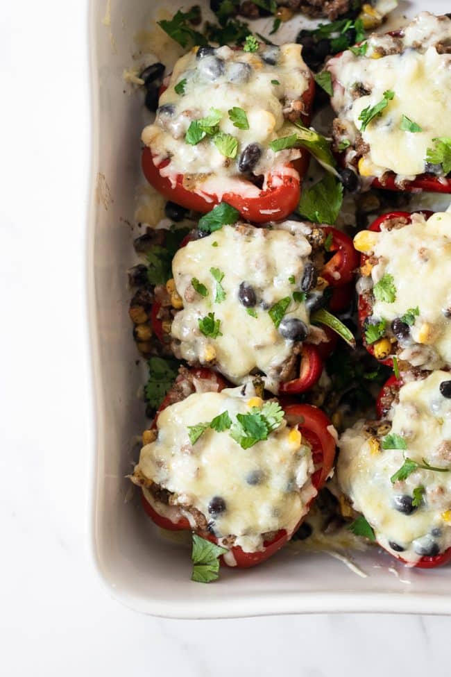 Easy Mexican Stuffed Peppers If you’re searching for an easy weeknight dinner recipe that satisfies and one that the family will love, look no further. These Mexican Stuffed Peppers are packed with flavor from the spices and come together in no time! #dinner #recipe #mexican #healthy #easy