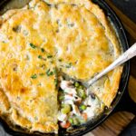 This easy skillet pot pie is a delicious one pan dinner that the entire family will love. It's the perfect recipe for using up leftover Thanksgiving turkey or even chicken!