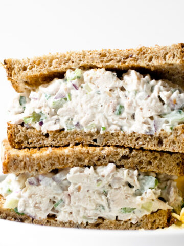 This chicken salad recipe is easy to make, just one bowl, and ready in minutes. Perfect on crusty whole grain bread or with crackers. You'll never want store-bought again!