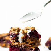 These mixed berry streusel bars are made with wholesome ingredients like oats, nut butter, and pure maple syrup. The crust and crumble topping are made from the same mixture so there's less bowls to clean! And the lemon glaze takes them up a notch!