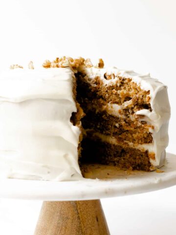 This carrot cake recipe is moist, bursting with spice flavor and topped with cream cheese frosting.