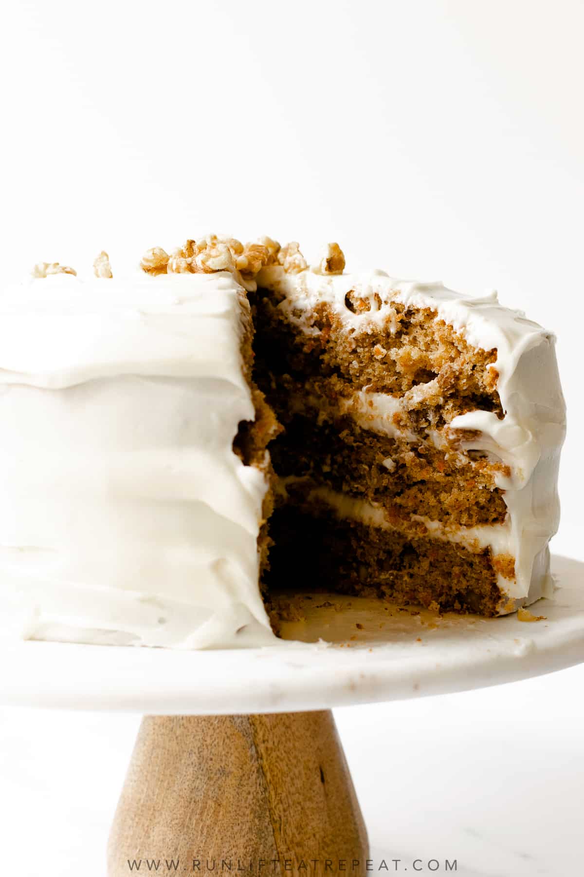 This carrot cake recipe is moist, bursting with spice flavor and topped with cream cheese frosting.