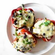 If you’re searching for an easy weeknight dinner recipe that satisfies and one that the family will love, look no further. These mexican stuffed peppers are packed with flavor from the spices and come together in no time!