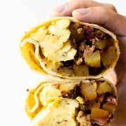 These make-ahead freezer breakfast burritos are super simple to make and loaded with everything we love about breakfast. It's an easy make-ahead recipe so there's no thought about breakfast in the morning!