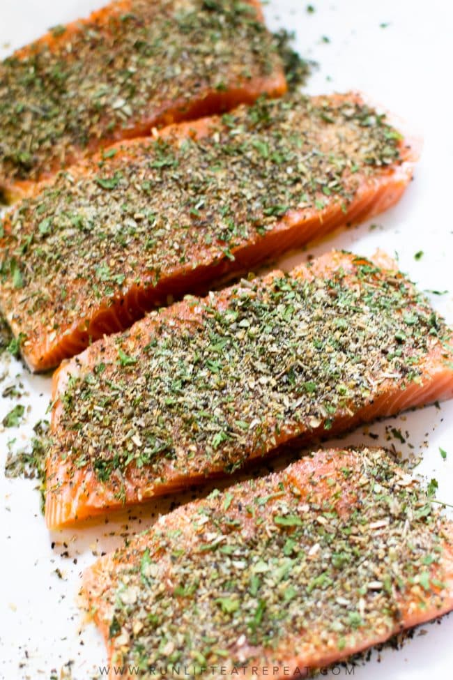 This easy baked herb crusted salmon is guaranteed to impress. It's smothered in an herb mixture and is ready in under 35 minutes!