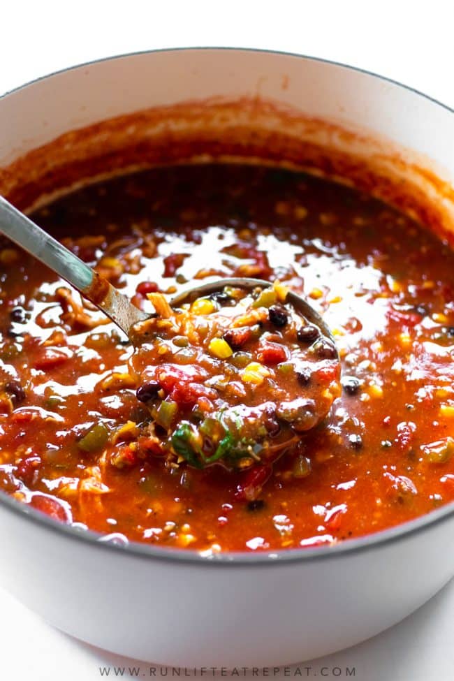 This chicken tortilla soup recipe is easy, homemade, and satisfying. The perfect dinner for those cold nights. Add your favorite toppings and adjust the spice level to your liking! It freezes perfectly and keeps for lunches all week.