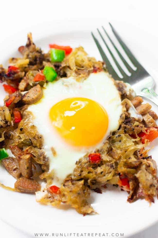 This super simple crispy breakfast potato hash is prepared in a skillet and combines all the breakfast classics into one dish! There's potatoes, peppers, onions, sausage, and eggs. One stop for all your breakfast needs!