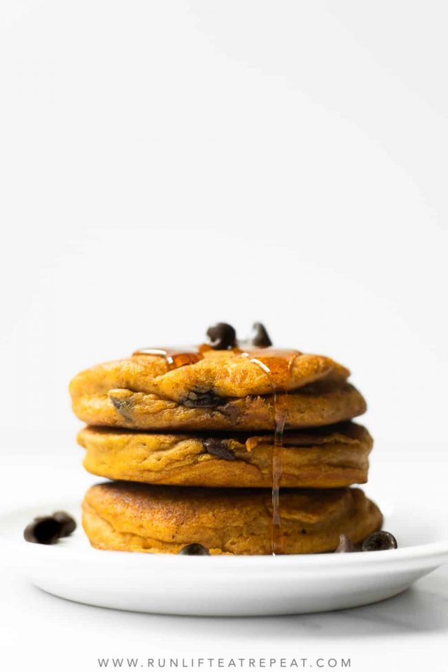 These homemade pumpkin chocolate chip pancakes are thick, moist and flavored with those iconic fall spices we all know and love. Start off your fall mornings with a large stack of these pumpkin pancakes.