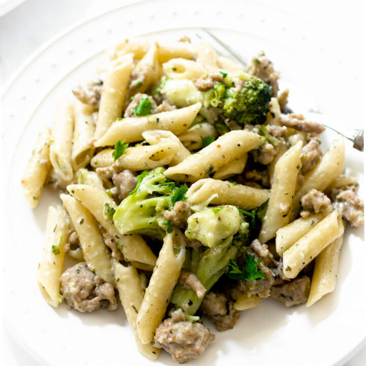This sausage and broccoli pasta is absolutely delicious. It's not only easy to make, but it's bursting with flavor, feeds a family, and keeps for days in the refrigerator for leftovers!