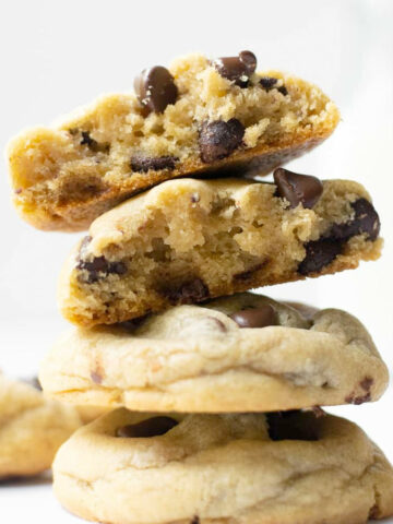 These big fat soft-baked chocolate chip cookies are thick and slightly crispy around the edges. The secret for the chewiest chocolate chip cookie texture is more brown sugar than granulated sugar, an extra egg yolk, plus a little cornstarch! No chilling required!