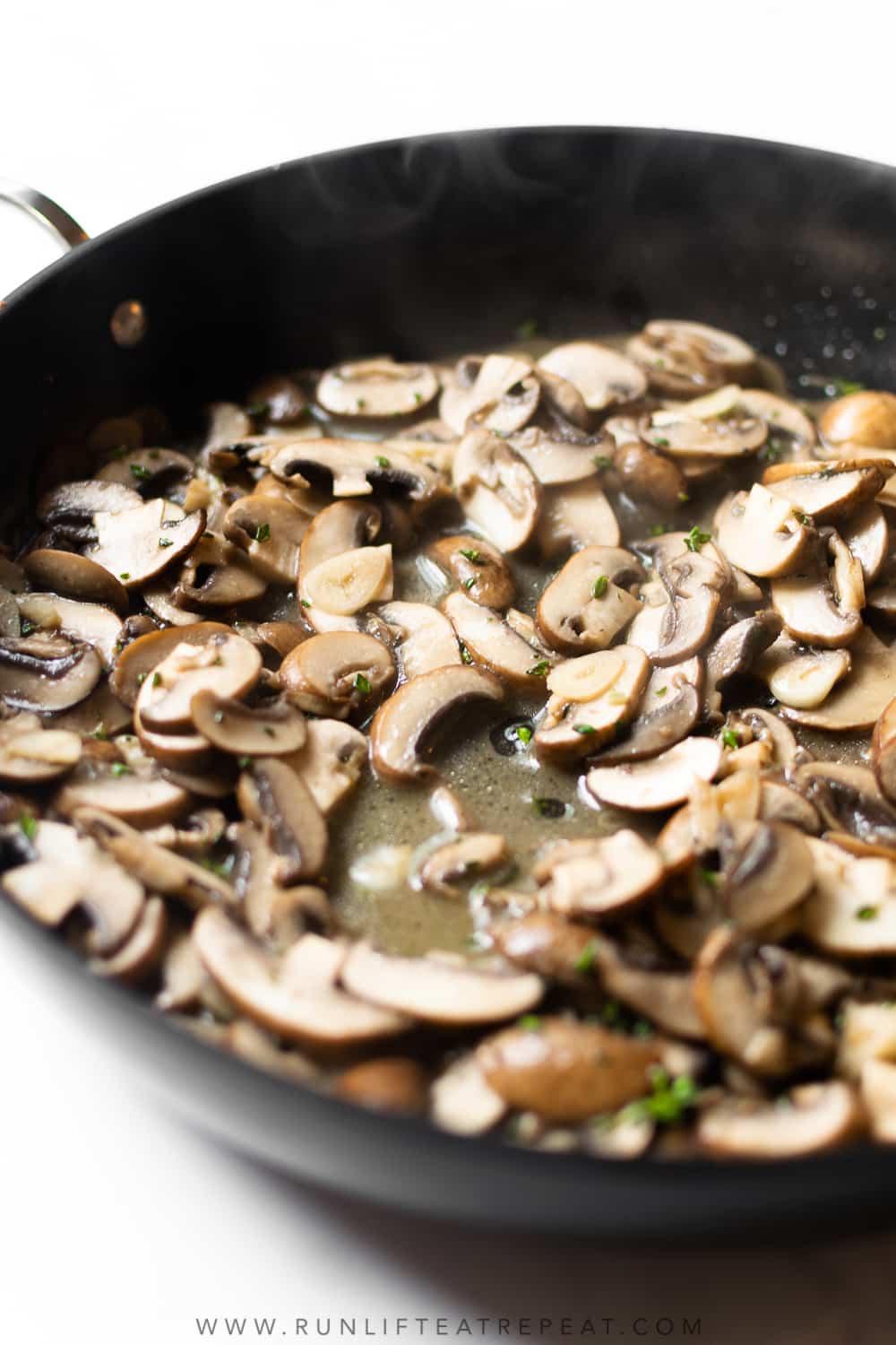 mushrooms in a skillet cooking