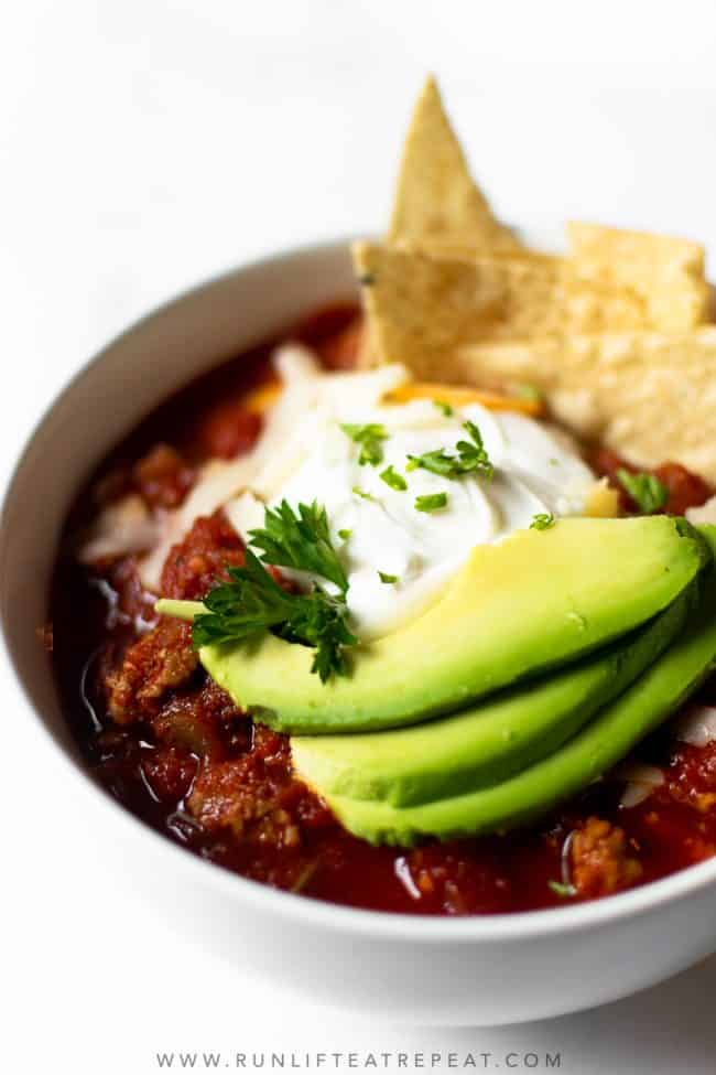 If you want a from scratch traditional chili recipe, look no further. This chili recipe is made with ground turkey (or beef), bell peppers, onion, tomatoes, beans, and a variety of spices. This is a feel-good, hearty, cozy dinner that everyone will love!