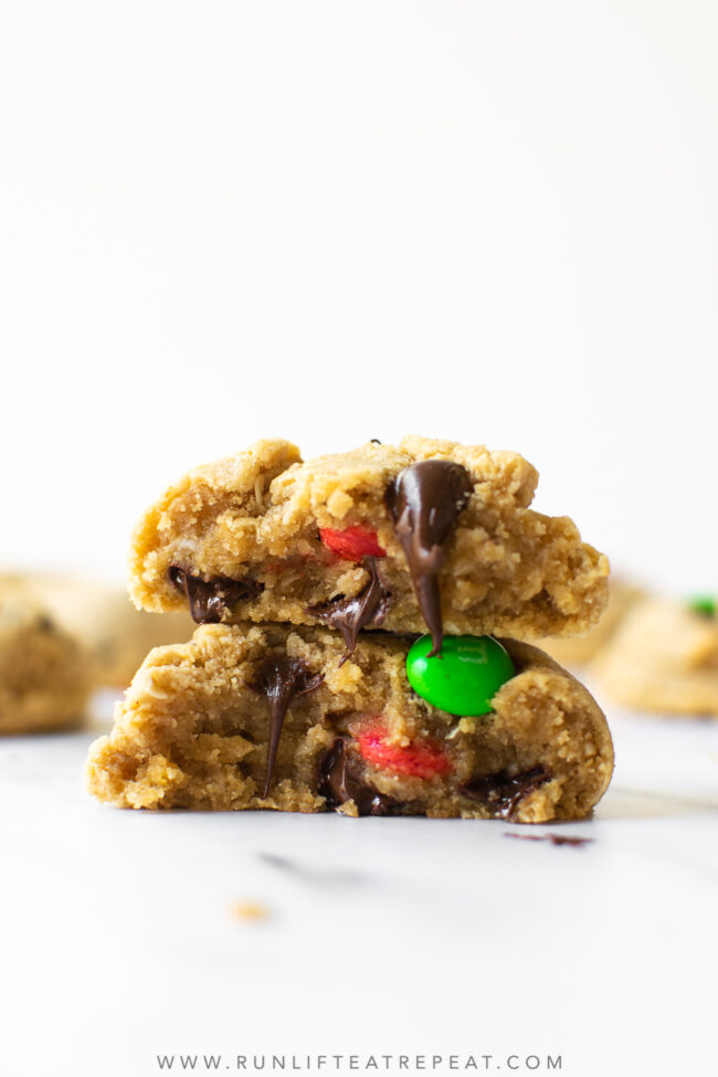 These monster cookies are filled with peanut butter, oats, chocolate chips, and M&Ms. These monster cookies are easy to make and produce a soft and thick cookie. And there's no dough chilling!