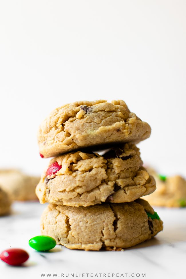 These monster cookies are filled with peanut butter, oats, chocolate chips, and M&Ms. These monster cookies are easy to make and produce a soft and thick cookie. And there's no dough chilling!