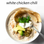 This slow cooker white chicken chili is a life saver during busy weeknights. It's an incredibly flavorful, comforting and easy recipe to make. It will guaranteed be a huge hit, even for those that typically don't like chili!
