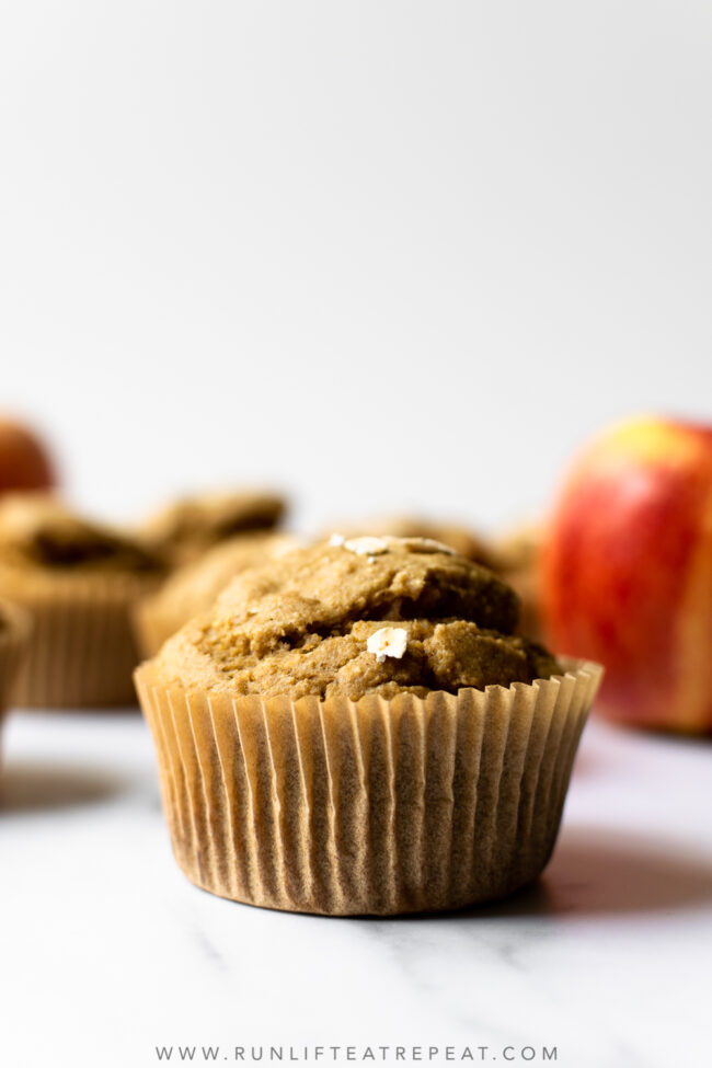 These easy and healthy apple banana oat muffins combine bananas, applesauce, oats and chopped apples. The batter comes together in a blender and the muffins freeze perfectly.