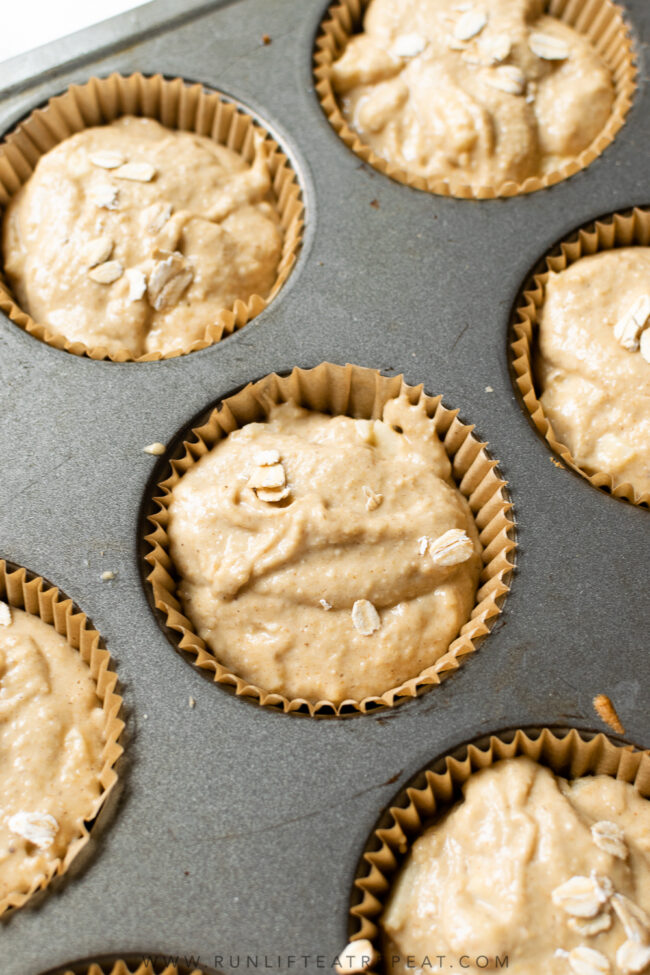 These easy and healthy apple banana oat muffins combine bananas, applesauce, oats and chopped apples. The batter comes together in a blender and the muffins freeze perfectly.