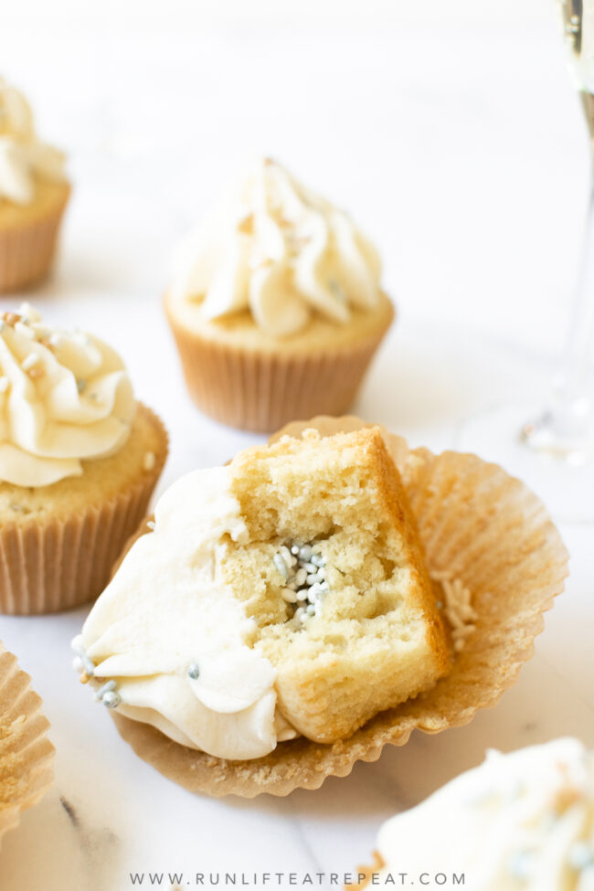 These party piñata cupcakes are fluffy, moist and filled with a sweet surprise. These are perfect for New Years Eve or even gender reveals or parties!