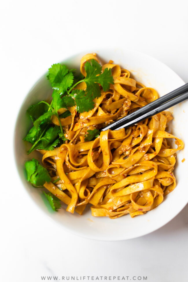 These spicy chili garlic noodles can be made in just 20 minutes and way better than takeout! The spicy garlic sauce has incredible flavor and perfectly spiced. You can easily add chicken or beef to make this a full meal.