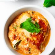 This zucchini lasagna has layers of thinly sliced zucchini, creamy ricotta cheese mixture, shredded cheese, flavorful marinara sauce, and then baked to perfection. This zucchini lasagna recipe is a family favorite and perfect for feeding a crowd!