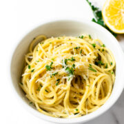 This simple spaghetti aglio e olio is packed with flavor from just a few basic ingredients. It's a recipe that's quick enough to make on a busy weeknight or a holiday and a pasta recipe that you'll make over and over again.