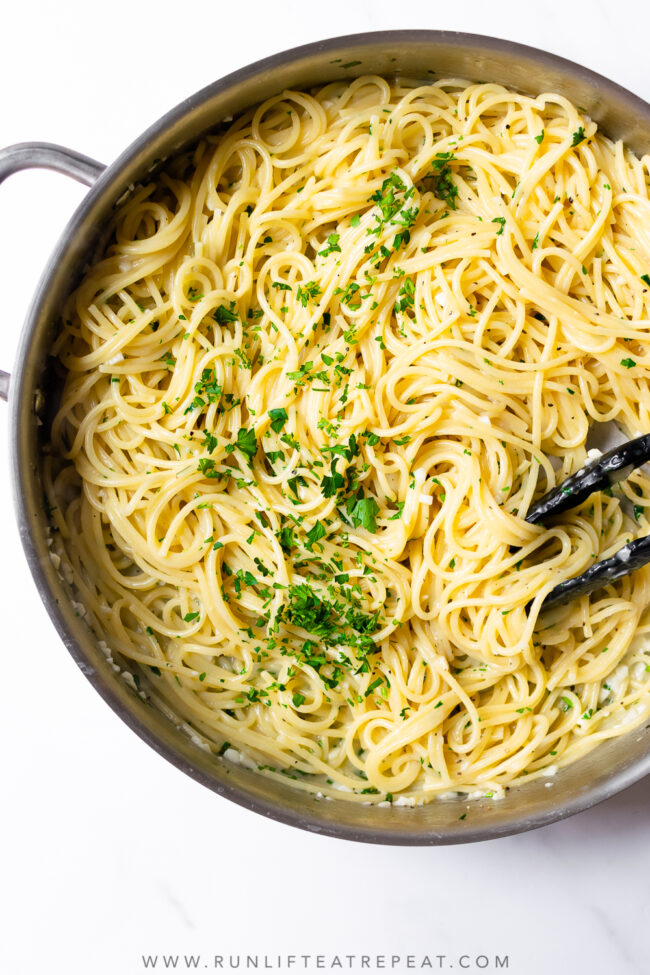 This simple spaghetti aglio e olio is packed with flavor from just a few basic ingredients. It's a recipe that's quick enough to make on a busy weeknight or a holiday and a pasta recipe that you'll make over and over again.