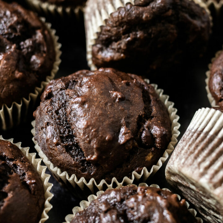 You haven't had a chocolate muffin until you've made these chocolate peanut butter banana muffins. It's where fudgy brownies meets moist peanut chocolate cake. This recipe is easy to follow and doesn't require a mixer!