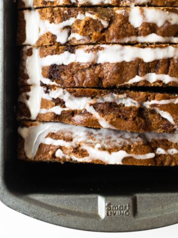 This cinnamon bread recipe is moist with a ribbon of cinnamon sugar swirled inside. You only need a handful of basic ingredients to make it and it's a recipe that the entire family will devour!