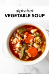 This homemade alphabet vegetable soup recipe is easy, satisfying, hearty, and flavorful. Not only is this soup made in one pot, it keeps perfectly for lunches all week. Use your favorite vegetables and small shaped pasta, like alphabet pasta.