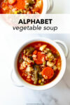 This homemade alphabet vegetable soup recipe is easy, satisfying, hearty, and flavorful. Not only is this soup made in one pot, it keeps perfectly for lunches all week. Use your favorite vegetables and small shaped pasta, like alphabet pasta.