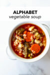 This homemade alphabet vegetable soup recipe is easy, satisfying, hearty, and flavorful. Not only is this soup made in one pot, it keeps perfectly for lunches all week. Use your favorite vegetables and small shaped pasta, like alphabet pasta.