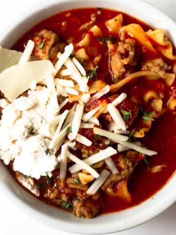 This lasagna soup recipe is easy, hearty, homemade, and satisfying. It's filled with Italian sausage, lasagna noodles and a ridiculously flavorful tomato broth. The soup is on the table in just 40 minutes and keeps perfectly for leftovers!