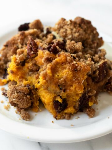 This homemade sweet potato casserole will be a star on your Thanksgiving table— one bite and you'll know why! It's full of flavor, comes together quick and topped with a pecan crumble topping for added crunch.