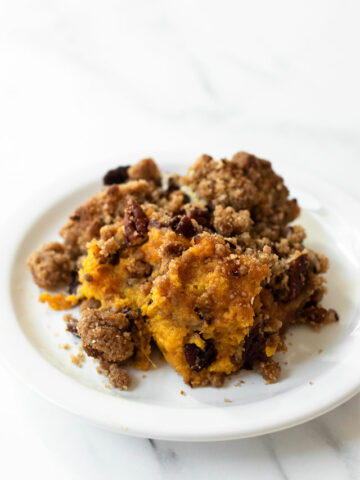 This homemade sweet potato casserole will be a star on your Thanksgiving table— one bite and you'll know why! It's full of flavor and topped with a pecan crumble for added crunch!
