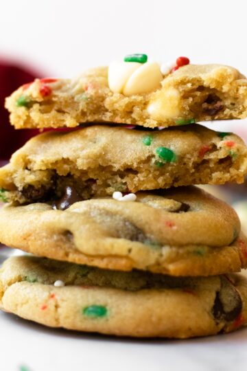 I'm certain that will love these cake batter chocolate chip cookies! Enjoy a chewy cookie with slightly crisp edges studded with white chocolate chips and festive sprinkles. These taste like a cross between chocolate chip cookies mixed with funfetti vanilla cake- truly a cookie recipe that you'll make over and over again!